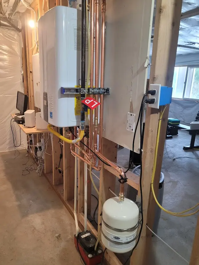 Licensed plumber repairing a kitchen sink in Crownpoint